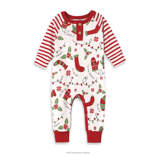 Baby romper with red and white stripes, red cuffs, and a design featuring a white Christmas stocking, green trees, and red accents.