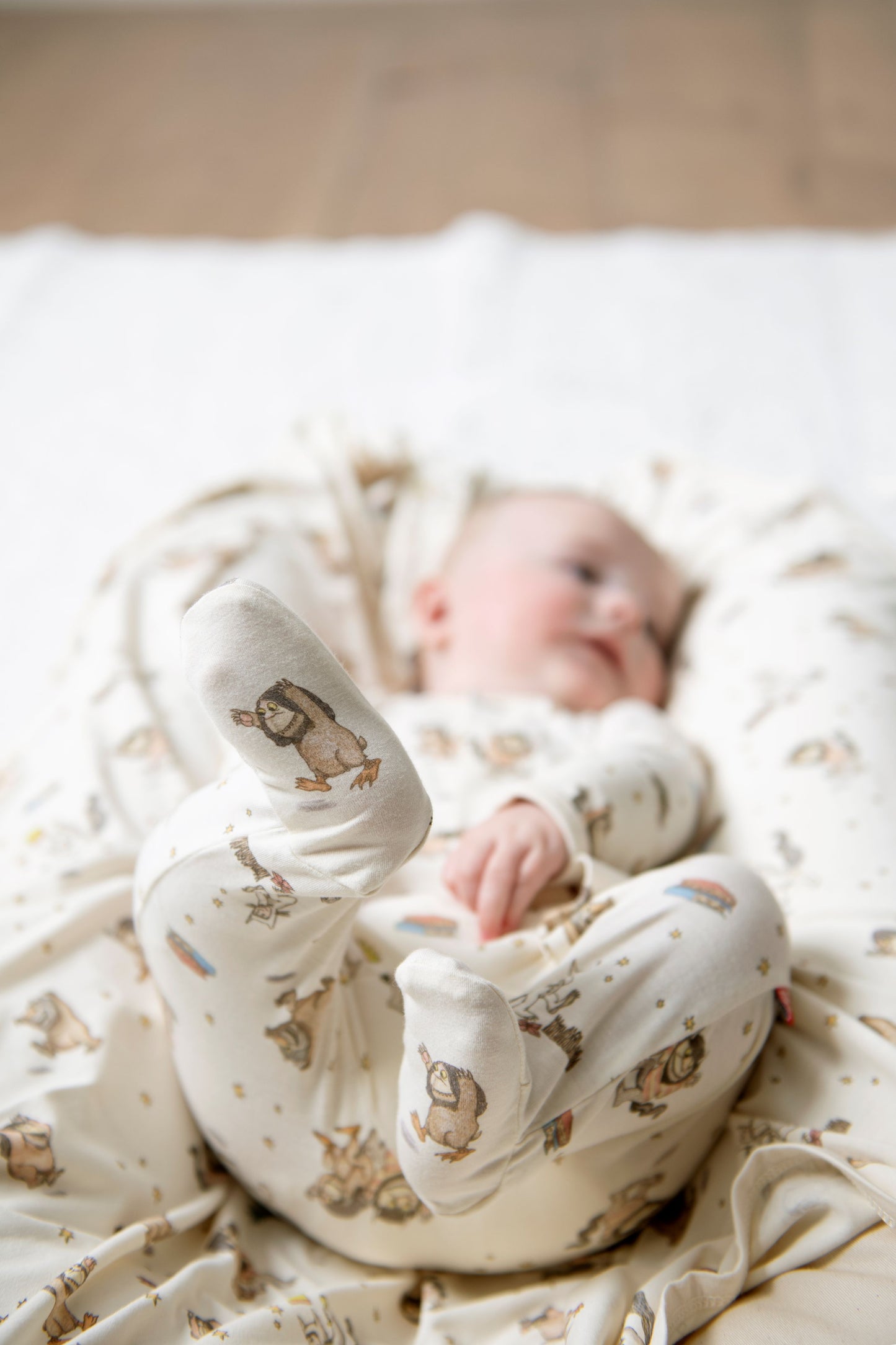 Baby in a Where the Wild Things are footie showing the print on the foot