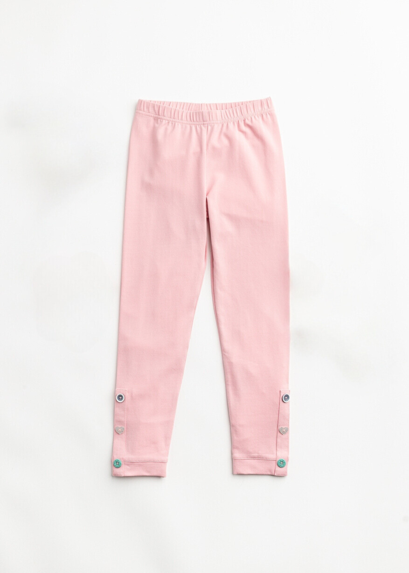 Pink pants with buttons on a white background