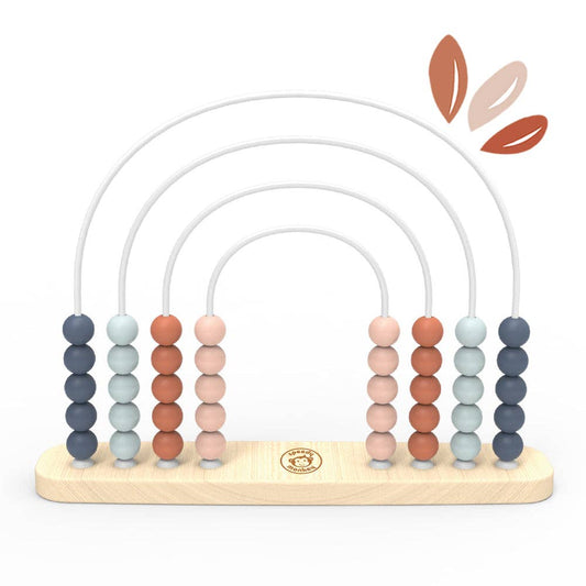 Wooden abacus toy with colorful beads on a white background