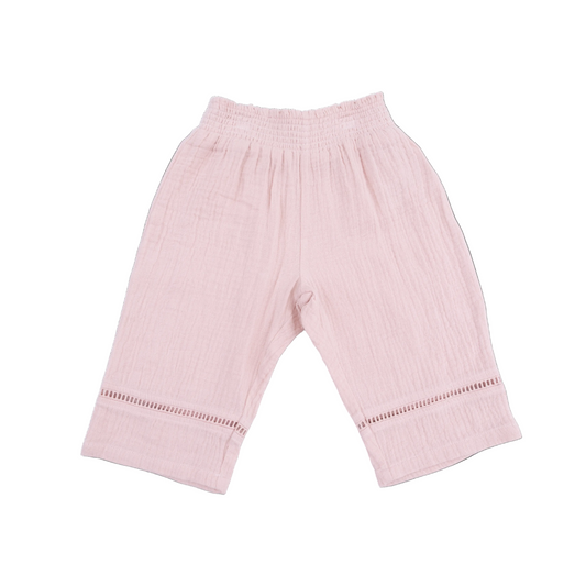 Pink baby pants with a subtle pattern on a white background