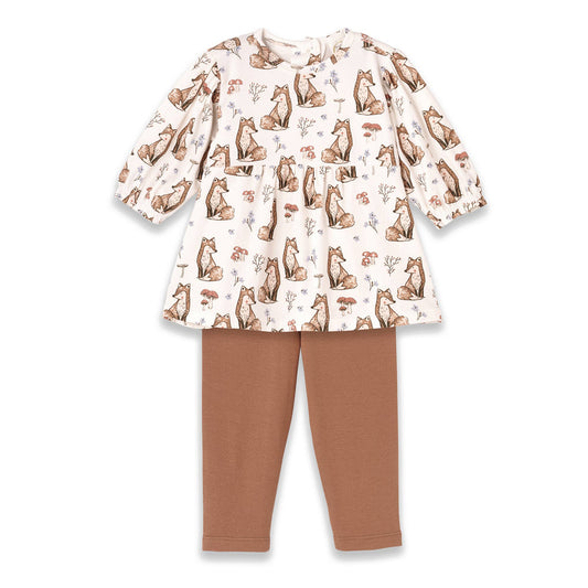 Children's outfit with fox patterned top and brown leggings on a white background