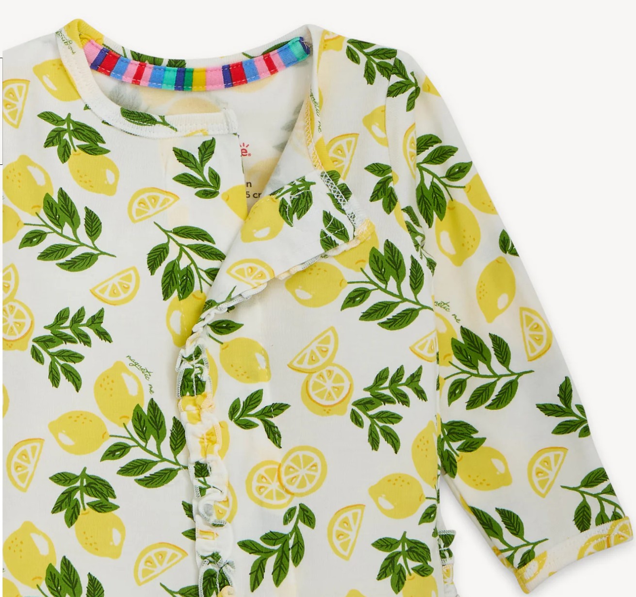 Children's onesie with lemon and leaf pattern on a white background