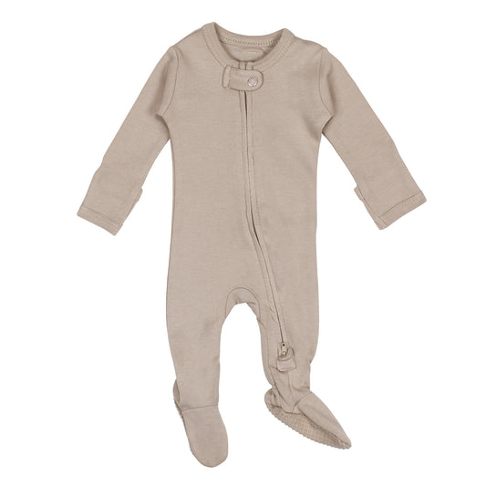 Beige baby onesie with footies on a white background