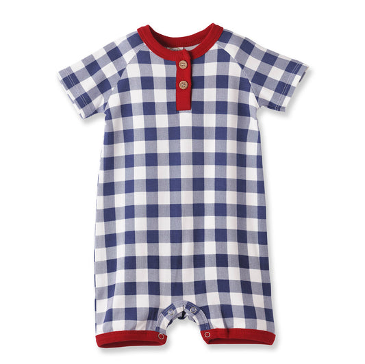 Blue and white checkered baby romper with red trim on a white background