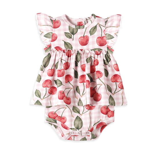 Baby romper with cherry pattern on a white background