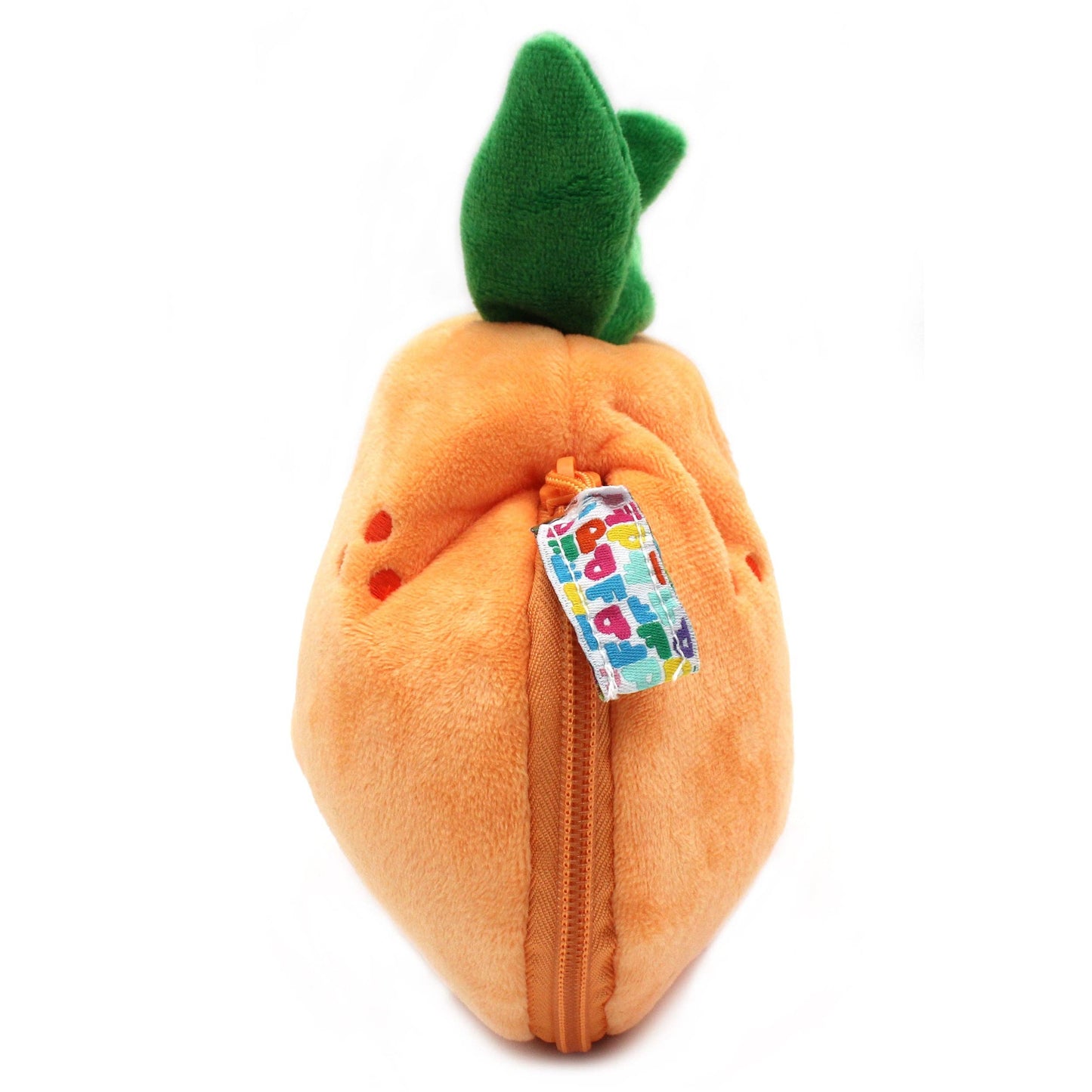 Plush tangerine toy with a colorful tag on a white background