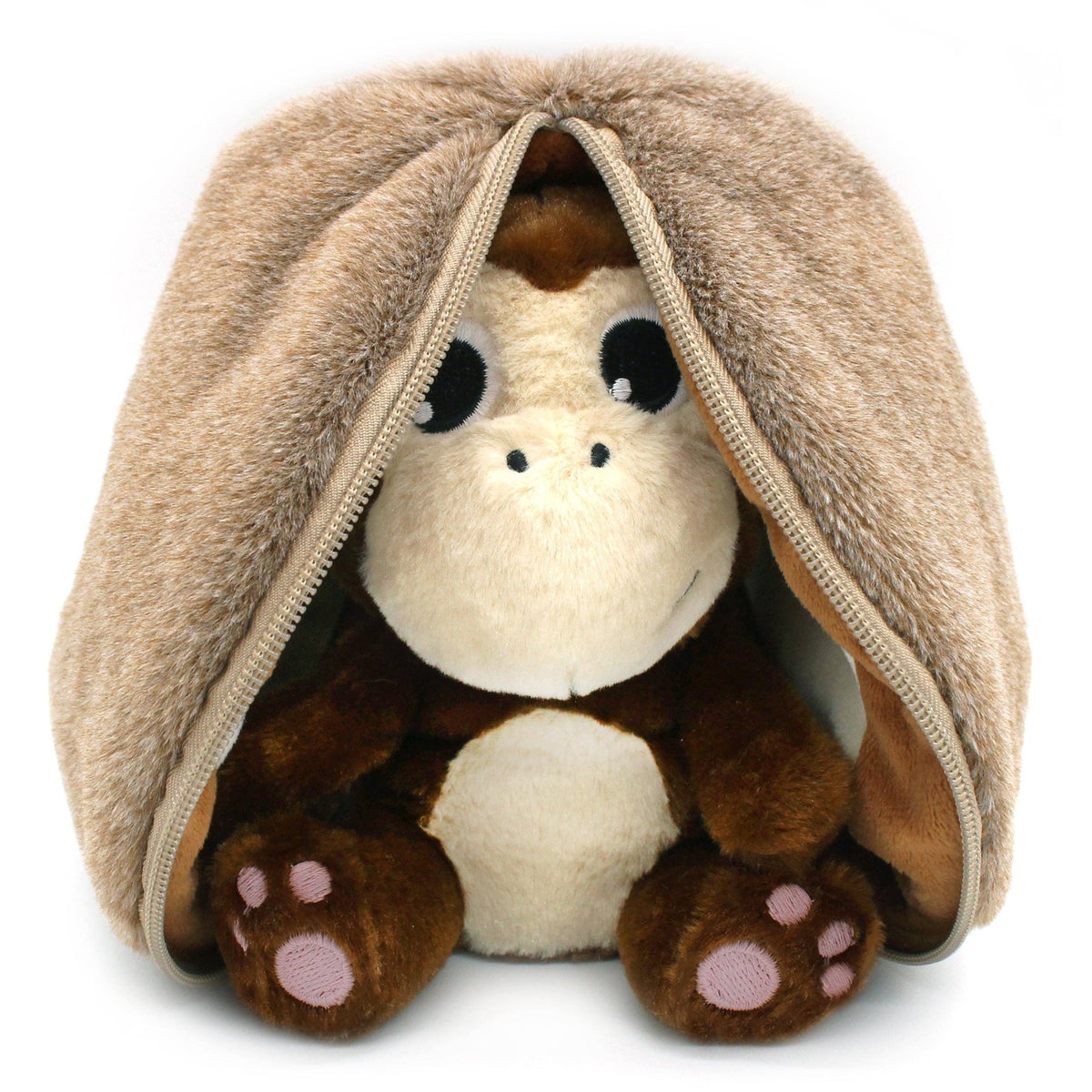 Plush toy monkey inside a coconut, on a white background