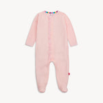 Pink baby onesie with buttons on a white background