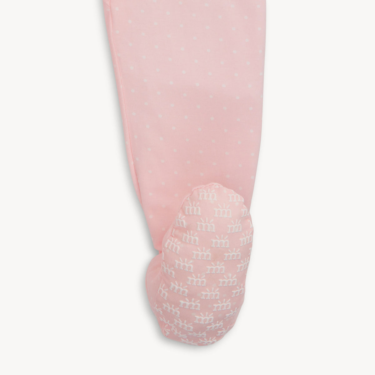 Pink tights with textured sole on a light gray background