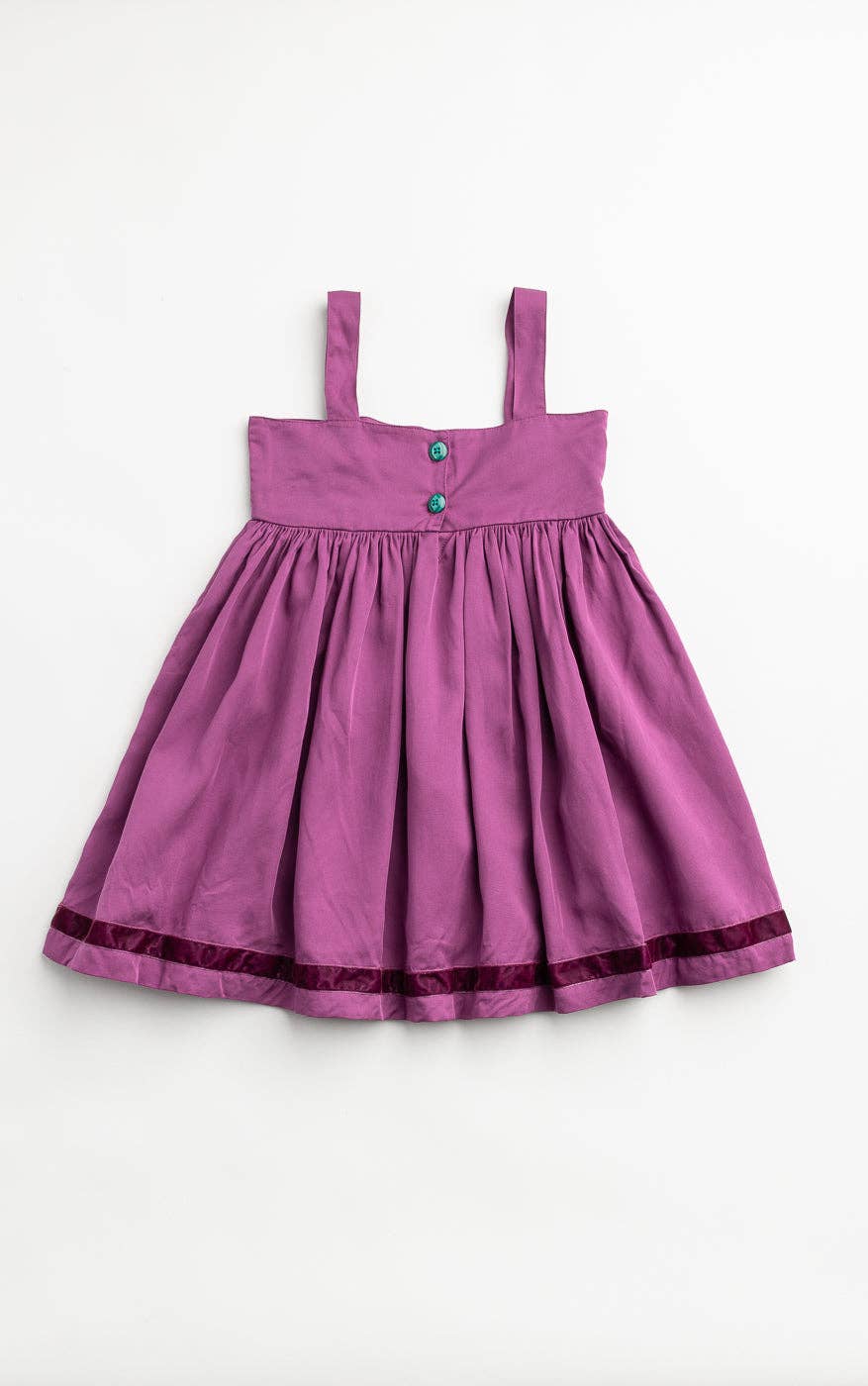 Purple dress with straps on a white background