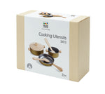 Box of Rattan Plan Toys cooking utensils on a white background