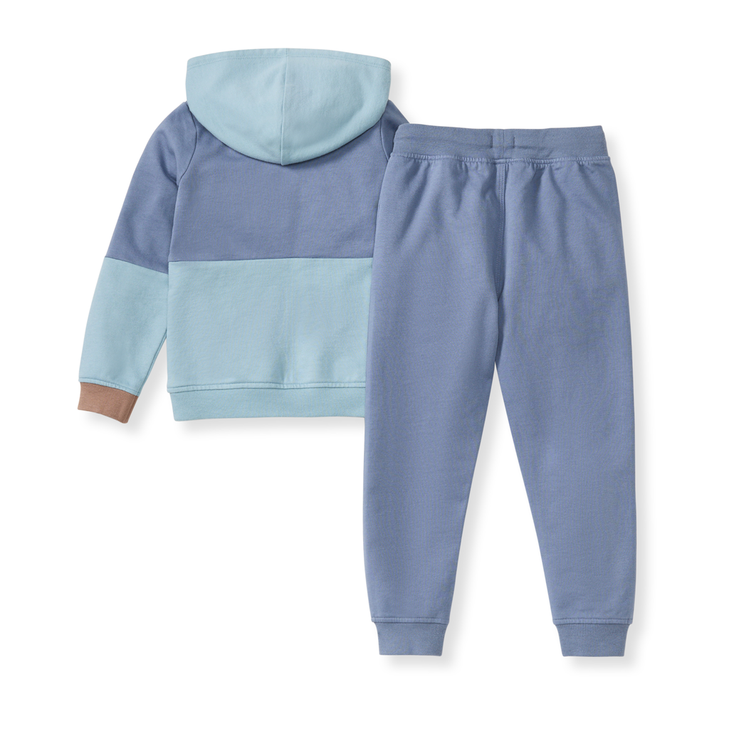 Blue and purple color-blocked hoodie and pants set on a white background