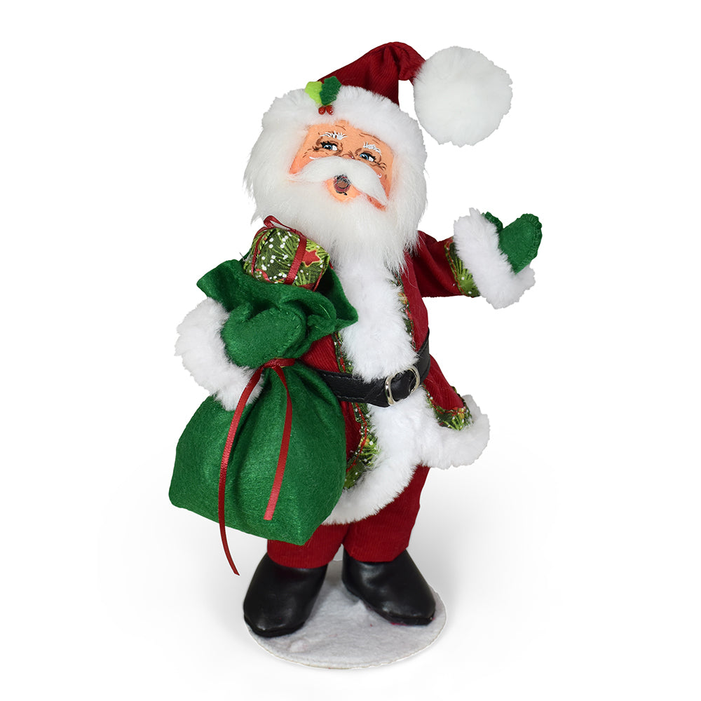 Annalee 9in Yuletide Santa in red corduroy suit with fuzzy white beard carrying a sack of presents