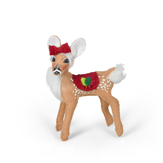 Annalee 5 inch Yuletide Fawn doll wearing a red corduroy blanket with holly and a bow on its head
