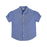 A blue chambray toddler shirt with a ruffle collar and short sleeves.