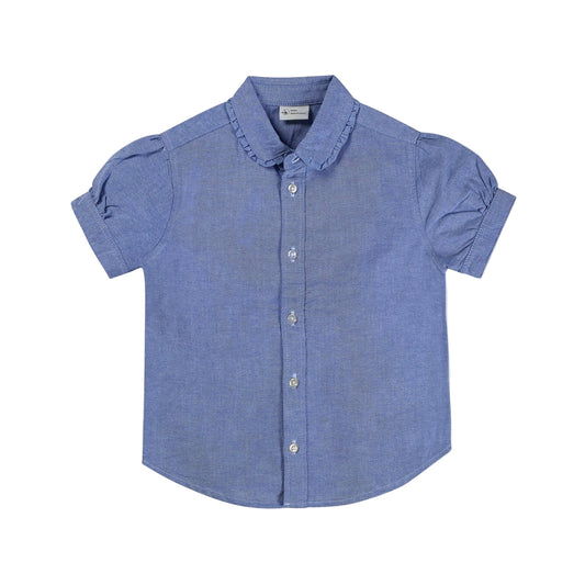 A blue chambray toddler shirt with a ruffle collar and short sleeves.