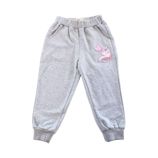 Gray sweatpants with a pink unicorn character on a white background