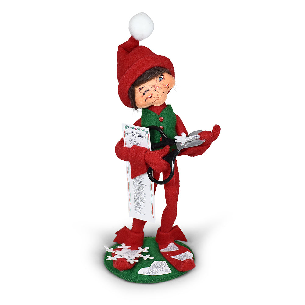 Annalee 9 inch Naughty Snowflake Maker Elf doll dressed in red with a green vest