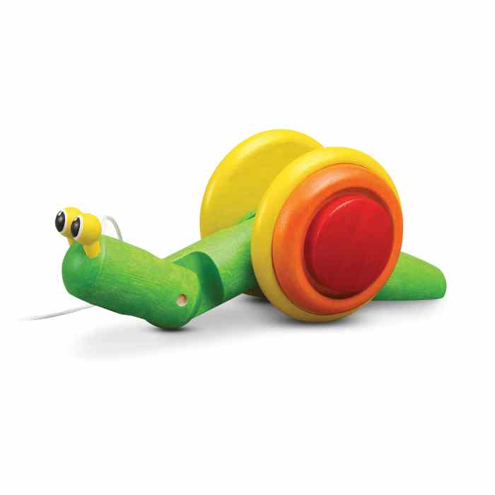 Colorful wooden toy snail on a white background