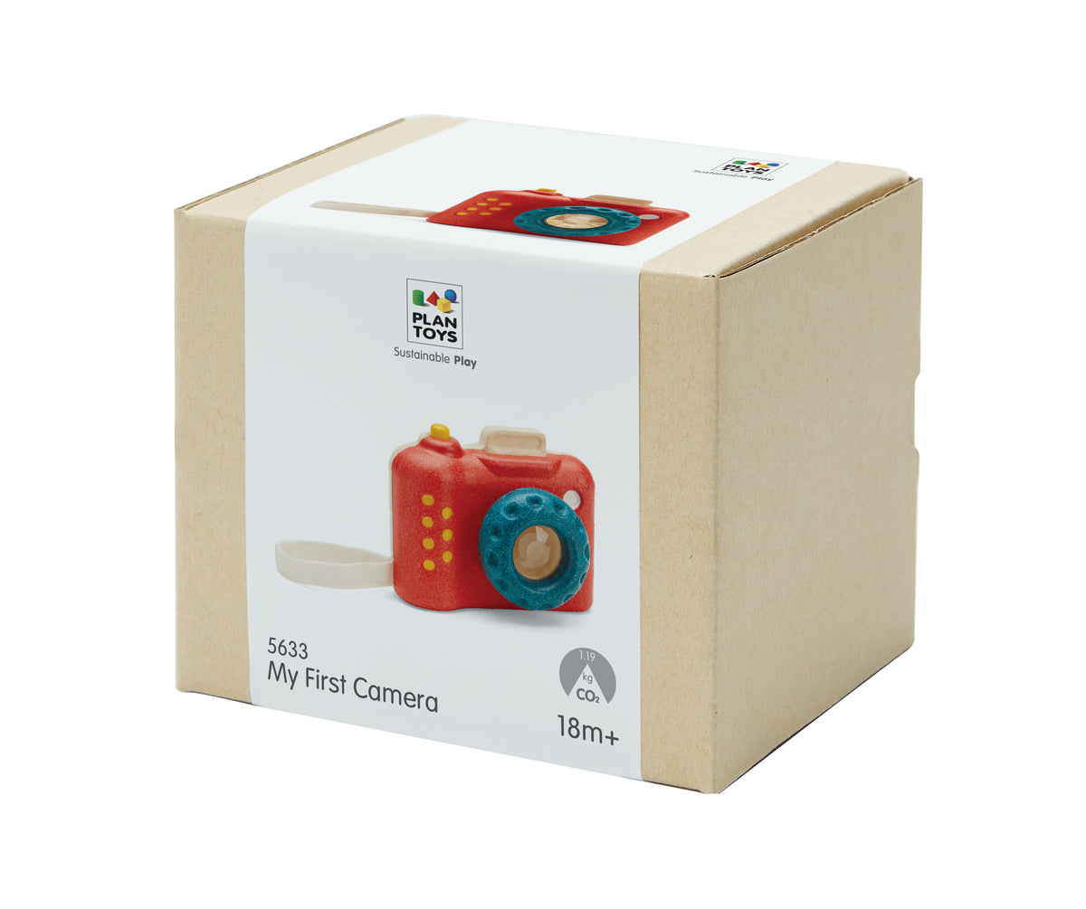 Box packaging of Plan Toys red camera toy on a white background