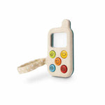 Toy phone with colorful buttons on a white background