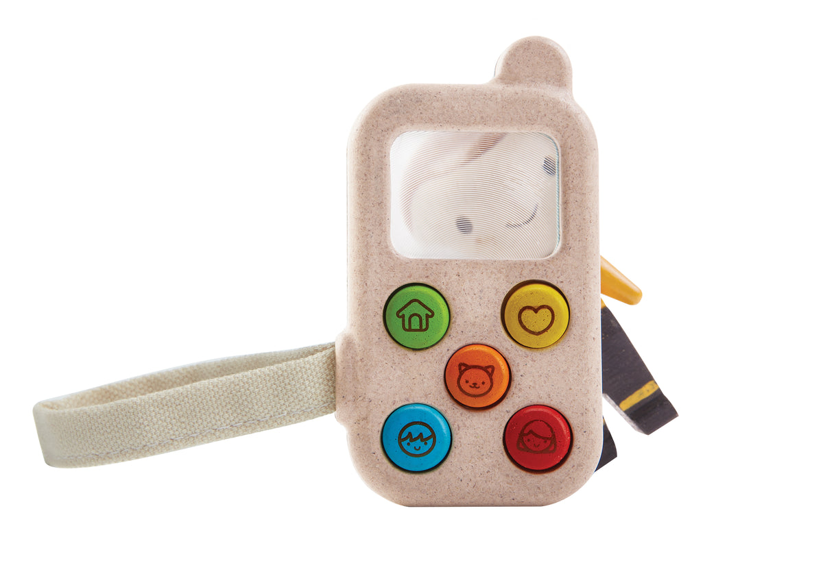 Children's toy phone with colorful buttons on a white background