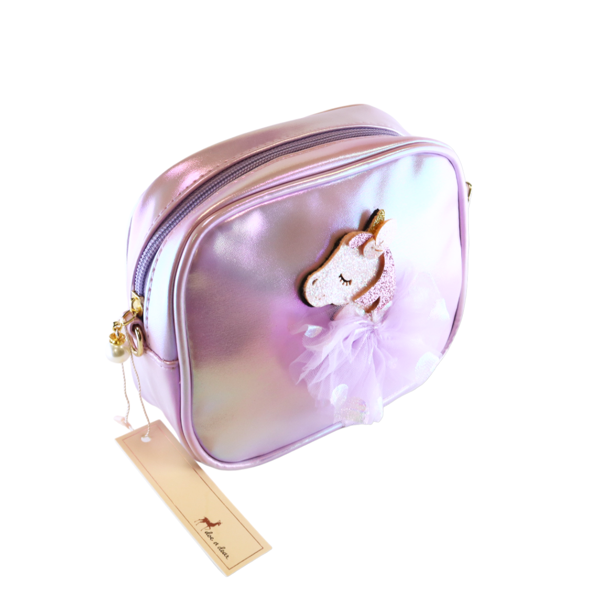 Purple makeup bag with unicorn charm on a white background