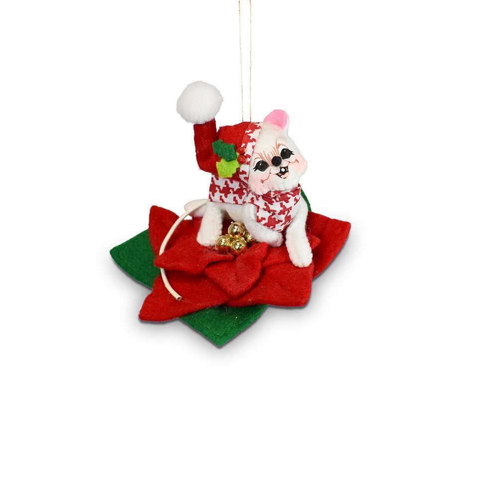 Annalee Jubilee Poinsettia Mouse 3 inch ornament lounging on a red poinsettia in a houndstooth scarf