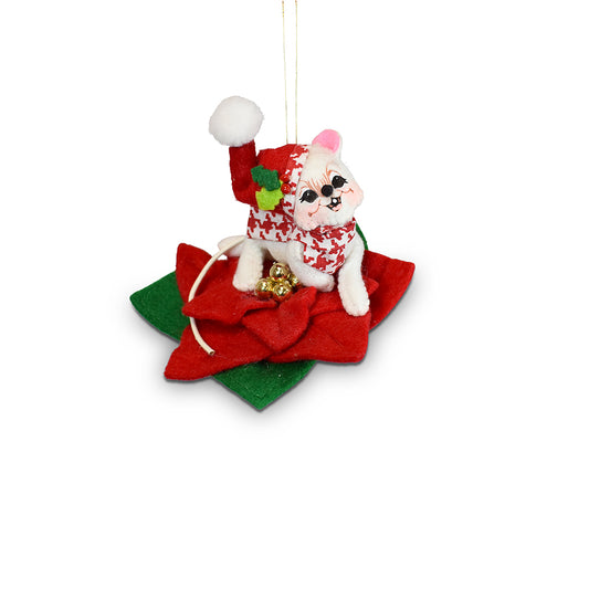 Annalee Jubilee Poinsettia Mouse 3 inch ornament lounging on a red poinsettia in a houndstooth scarf