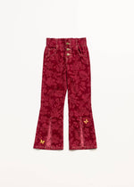 Red floral-patterned pants with gold buttons on a white background