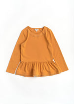 Orange long-sleeve top with ruffled hem on a white background