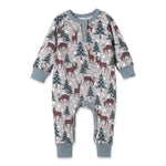 A festive Christmas-themed baby romper with a pattern of trees and reindeer, featuring a blue Henley neckline and cuffs.