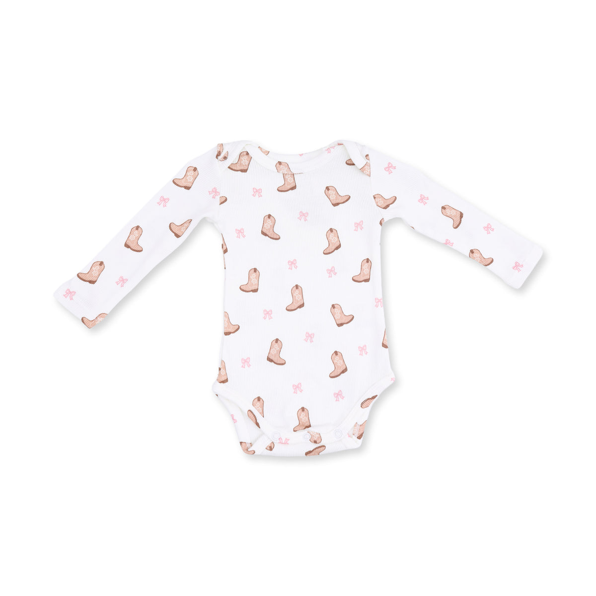 A white long-sleeve baby bodysuit featuring a repeating pattern of light brown cowboy boots and small pink bows, laid flat against a white background.