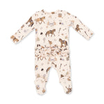 A baby long-sleeve footed sleeper in cream with an all-over equestrian-themed print of brown horses, reins, and bits, featuring a ruffled hem.