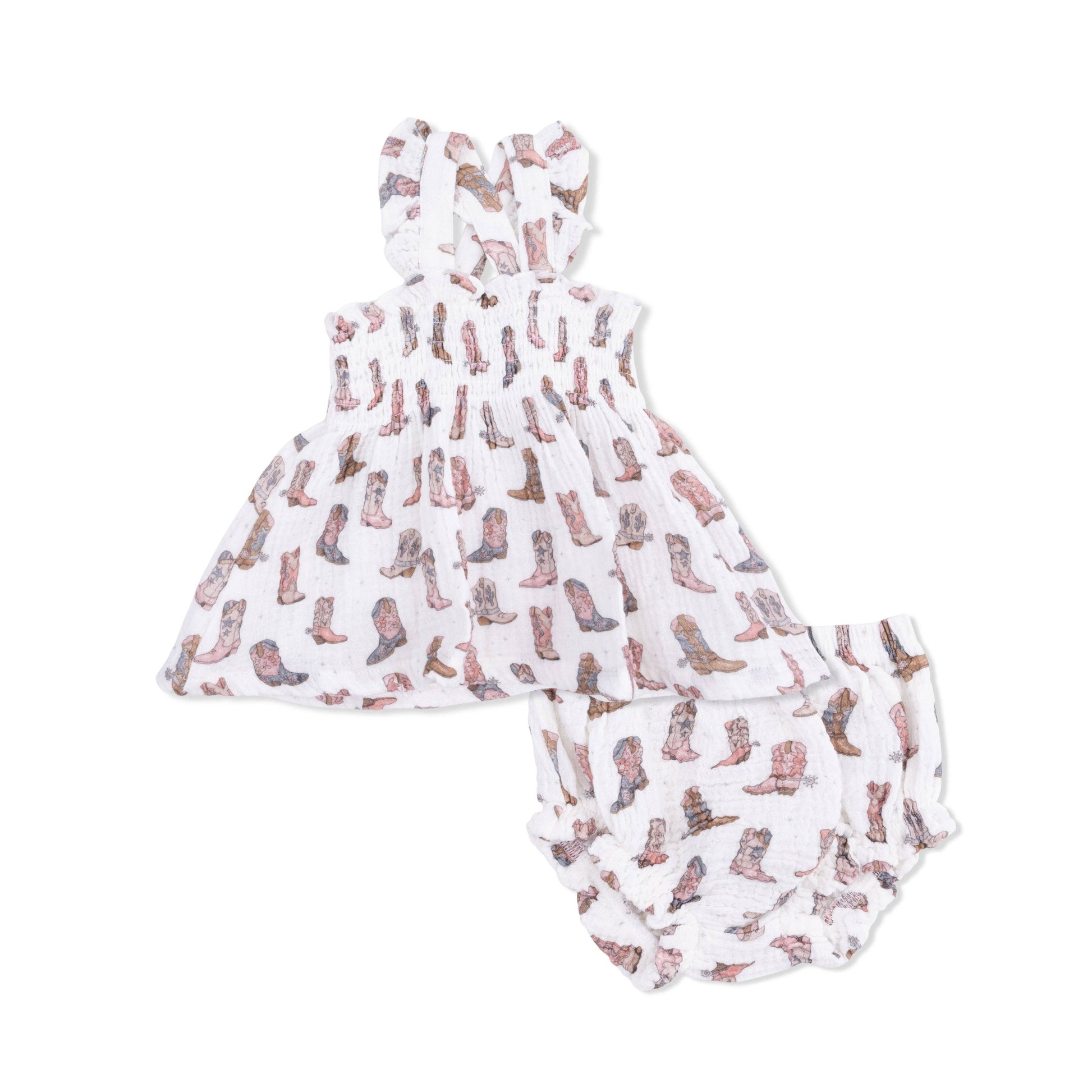 Baby romper with cowboy boot pattern on a white background