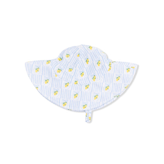 Baby sun hat with lemon pattern on a white background