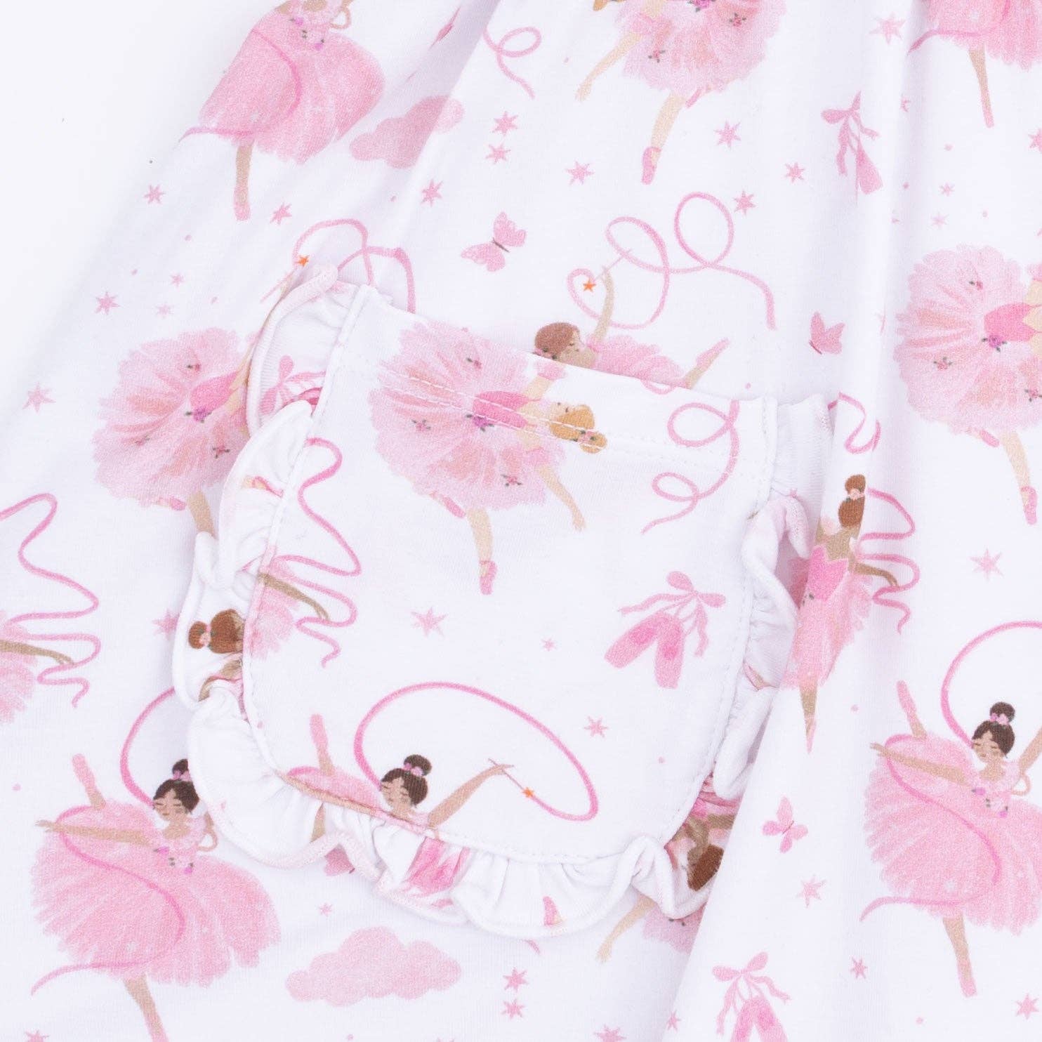 fabric with pink ballerina pattern on a white background