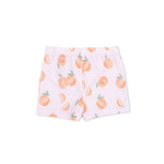 back of shorts with peach pattern on a pink background