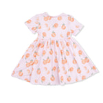 back of pink dress with peach pattern on a white background