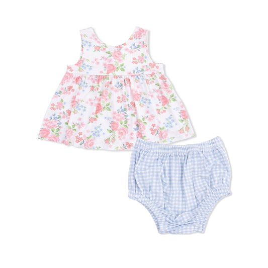 Floral dress and checkered bloomers set on a white background