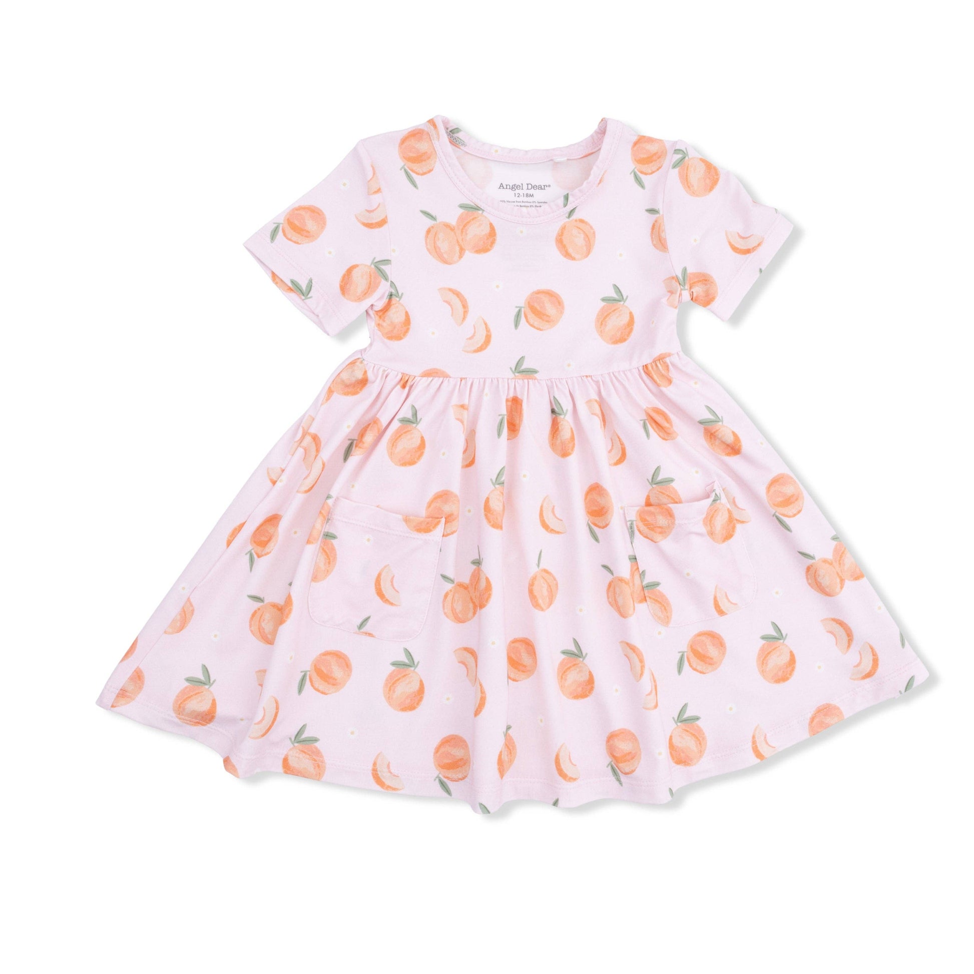 Pink dress with peach pattern on a white background