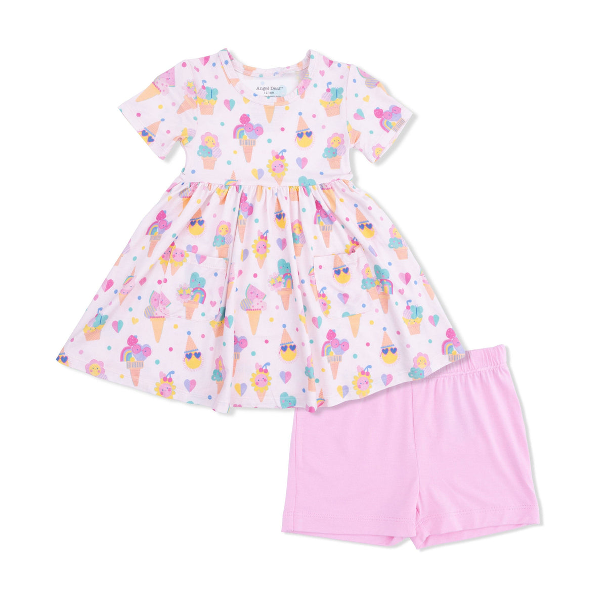 Children's dress with ice cream pattern and pink shorts on a white background