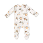 A baby footed sleeper with long sleeves and an all-over cute cartoon bubble tea and coffee cup pattern on a white background.