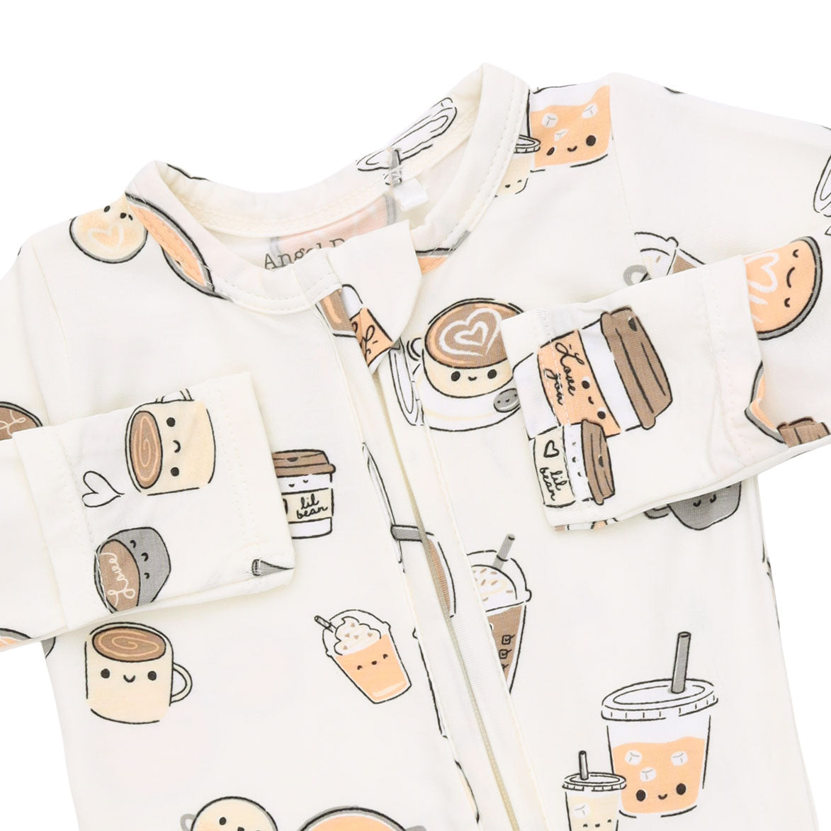 A baby zip-up sleeper in a warm off-white fabric, decorated with a cute cartoon pattern of coffee cups, iced drinks, and desserts.