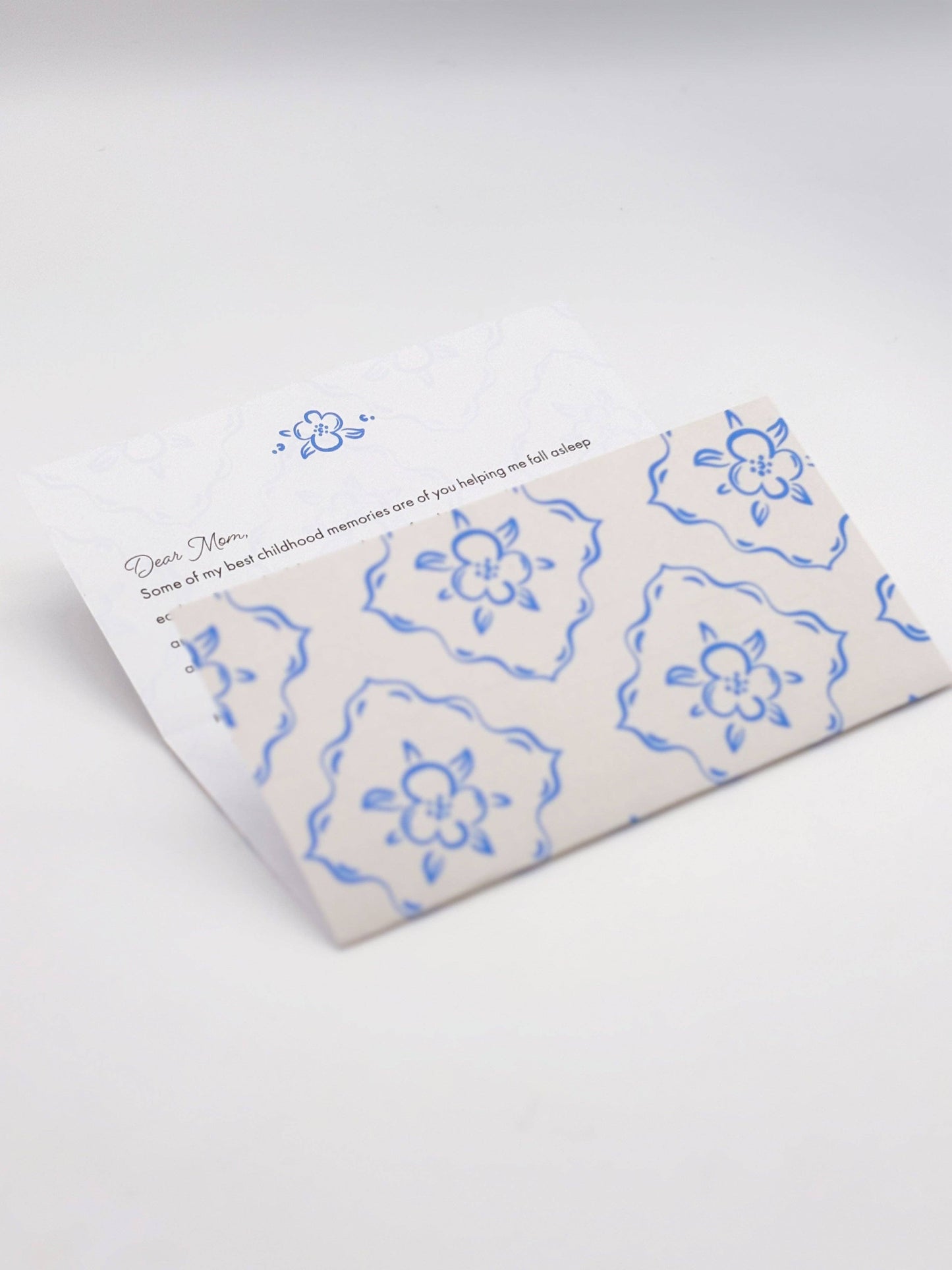 Floral patterned product packaging on a white background