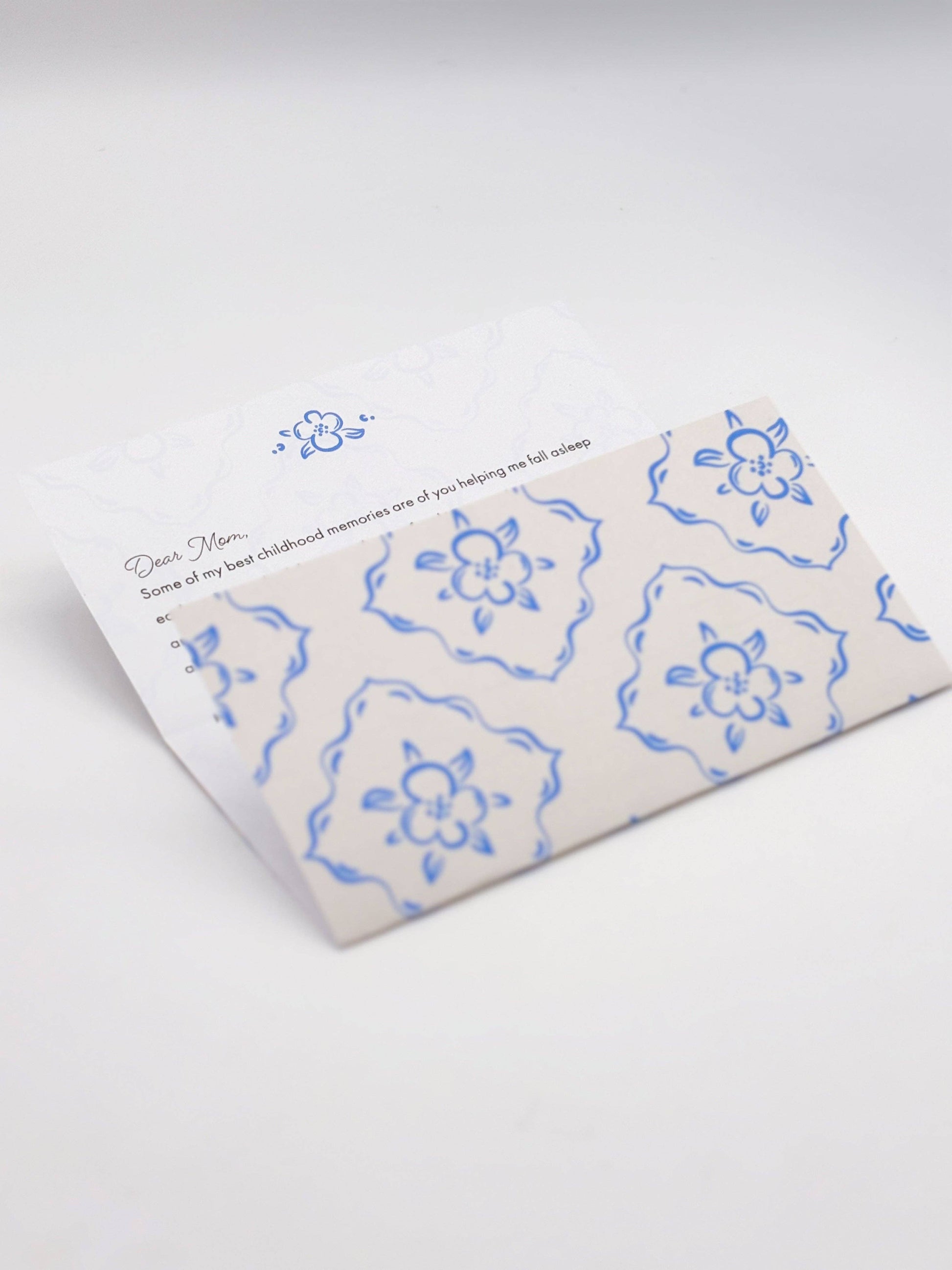 Floral patterned product packaging on a white background