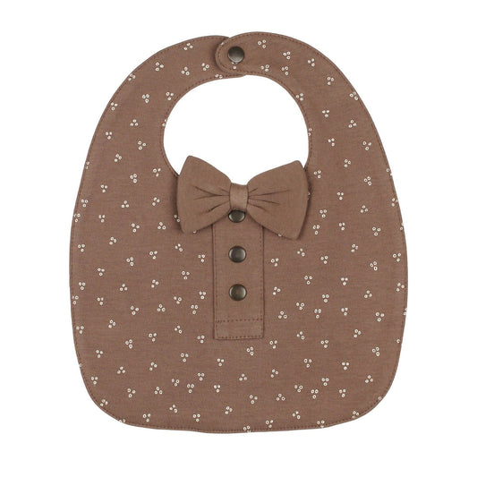 Brown bib with bow and button details on a white background