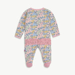 Floral baby onesie with pink accents on a white background