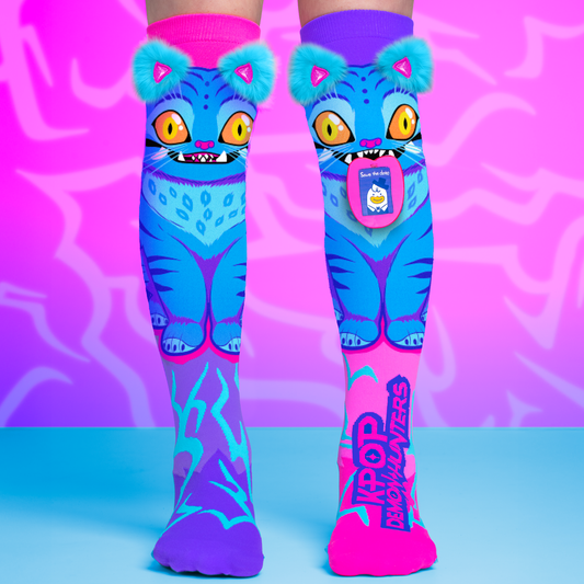 Colorful K-pop knee-high socks with cat design on a pink and blue background